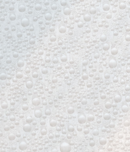 Matterende Dråber - selvklæbende folie - 45x200 cm fra Tapetcompagniet 